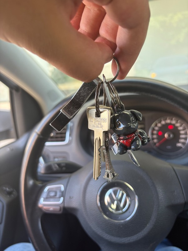Custom black labrador keychain hanging from a set of car keys